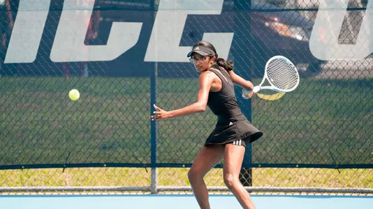 Rice women's tennis player Nithesa Selvaraj lines up a return shot during a recent match