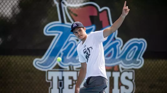 Rice men's tennis player Petro Kuzmenok calls an opponent's shot out during a match at the 2024 AAC Championships
