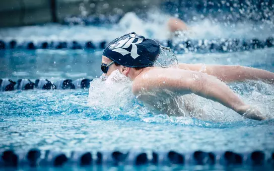 Archibald Wins 100 Fly; Owls Move Into Third at NIC