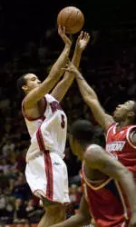 Men's Basketball Hits The Road Looking To Hand Rhode Island First Home Loss