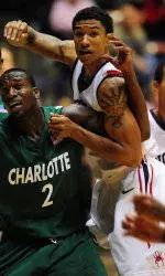 Harper's 27 Leads Spiders Over 49ers In A-10 Opener