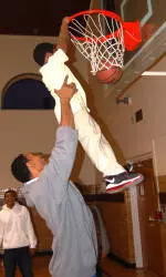 Men's Basketball Visits St. Joseph's Villa After School Program