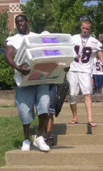 The Spider Football Squad Lends Muscle On Freshmen Move-In Day
