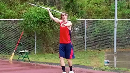 Spiders Wrap Up Rainy Day in Williamsburg