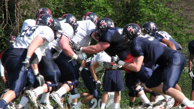 Spider Football Opens Training Camp Today