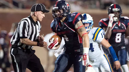 Spider Football Puts Out Liberty Flames In 2OT