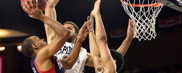 Strong Defensive Effort Leads Spiders Past Howard