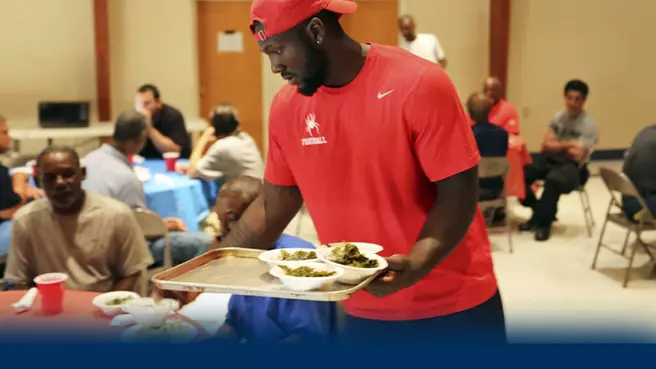 Spider Football Volunteers With CARITAS