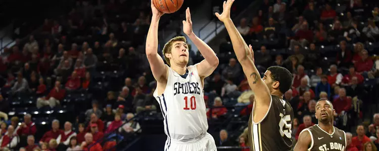 No. 22 Dayton Withstands Furious Spider Rally, 63-60
