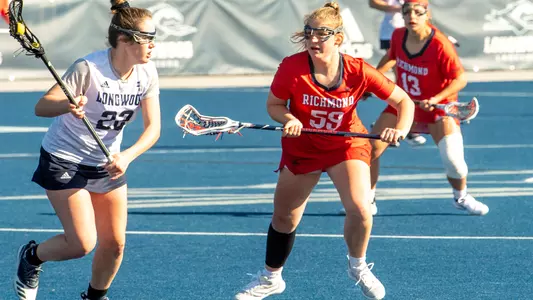 Evelyn Roberts plays defense against Longwood