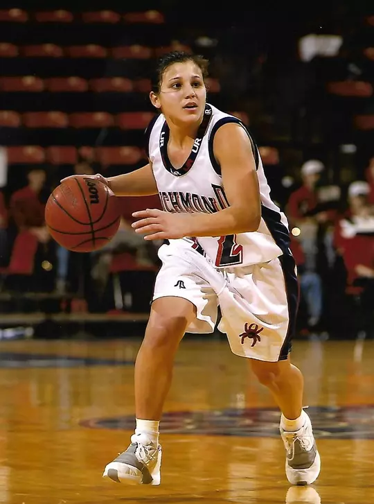 Michele "Belle" Koclanes Dribble '02