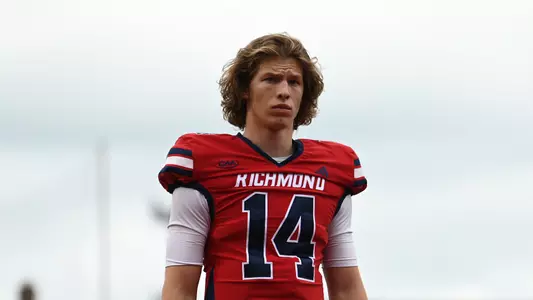 Camden Coleman warming up during Richmond's game against Hampton, Sept. 30, 2023