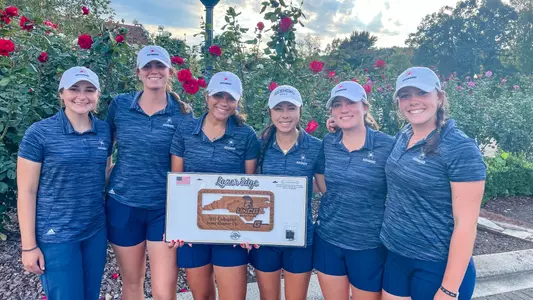 TheThe women's golf team poses with a runner-up trophy from the UNCG Fall Invitational women's golf team poses with a runner-up trophy from the UNCG Fall Invitational