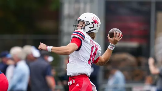 Cam Coleman passes during Richmond's 24-17 win over #22 Rhode Island, Oct. 17, 2023