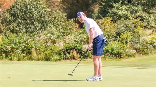 Cole Ekert watches his putt travel to the hole