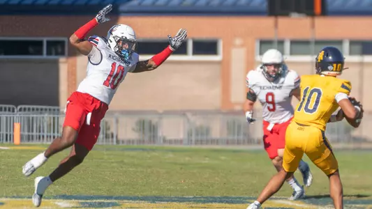 Jared Joseph leaps in an effort to block a pass from North Carolina A&T's quarterback, Oct. 21, 2023