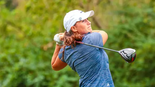 Claire Yioulos stares down her teeshot