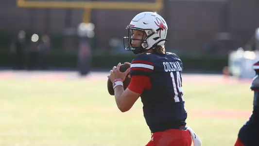 Quarterback Camden Coleman looks for an open receiver during Richmond's 42-31 win over Maine, Oct. 7, 2023