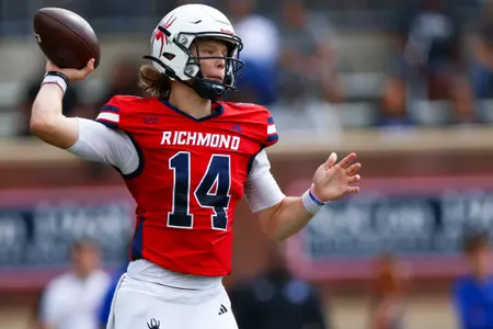 Camden Coleman making a pass during Richmond's game against Hampton Sept. 30, 2023