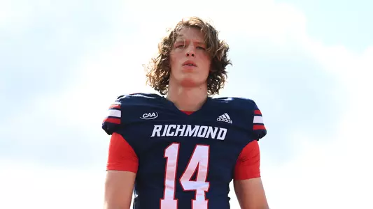 Quarterback Camden Coleman during warmups ahead of his first career start during the Spiders Oct. 7, 2023 matchup against Maine