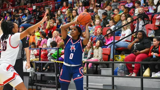 Laren VanArsdale looking to pass the ball to an open player at Gardner-Webb