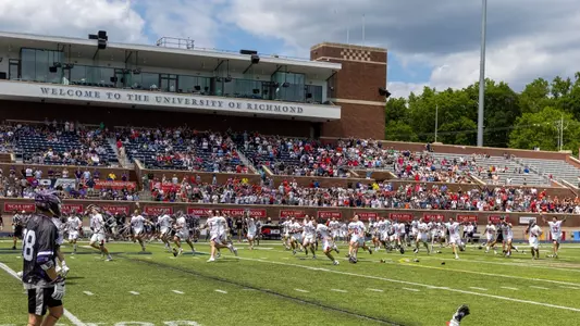 Men's Lacrosse storms the field after their 2023 Atlantic 10 Championship game