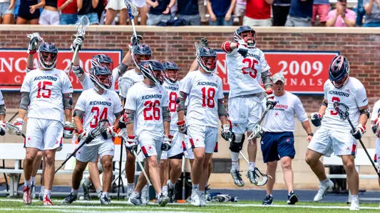 Men's lacrosse celebrates a goal during its 15-8 win over High Point in the 2023 Atlantic 10 title game