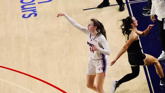 Maggie Doogan shooting the ball against App State