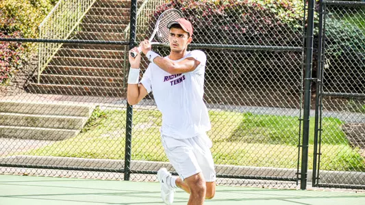 Sebastian Miano hitting a ball during a tennis match