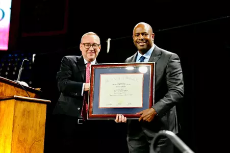 Leland Melvin and President Kevin Hallock