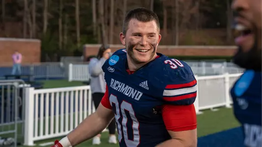 Tristan Wheeler smiles after the Spiders 42-0 playoff victory over Davidson in the first round of the NCAA FCS playoffs