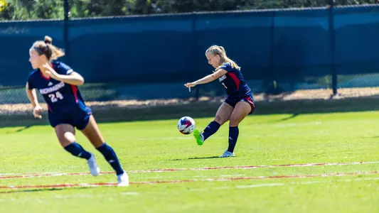 Photo of Cameryn Sicard kicking a free kick