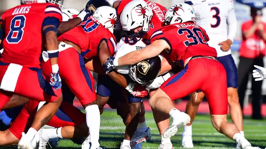 Gang tackle during Richmond's 17-10 home opener loss to Morgan State