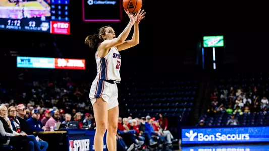 Ullstrom shooting a three pointer against Massachusetts