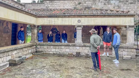 Student-athletes tour a church on the island of Rhodes