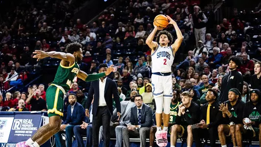 Jordan King shoots a jumpshot from the left win vs George Mason