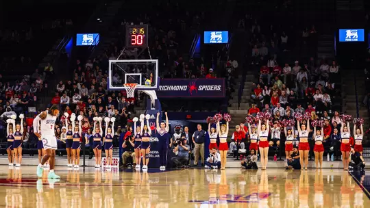 Fans and Spider cheerleaders at the Jan. 24 game vs GW