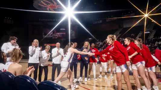 Siobhan Ryan going down the Women's Basketball tunnel during starting lineups