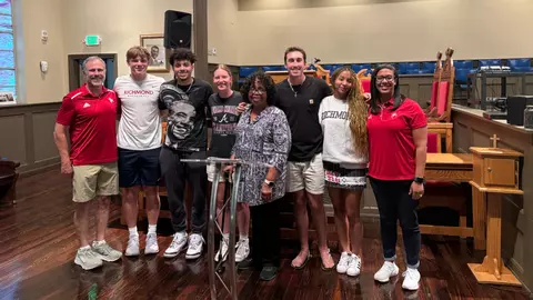 A group of student and administrators pose for a picture during their tour of Civil Rights sites