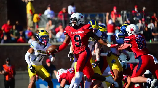 Zack Palmer-Smith runs in a touchdown against Delaware on Oct. 19, 2024