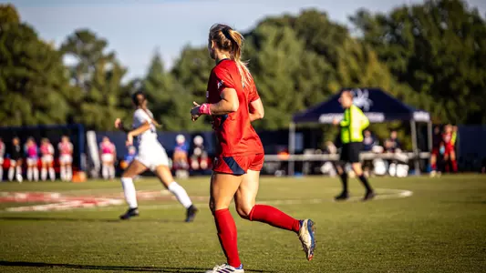 Maggie Fralin running during a soccer game