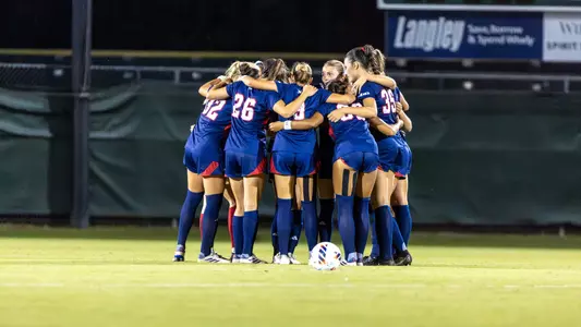 Spider Soccer huddled arounds