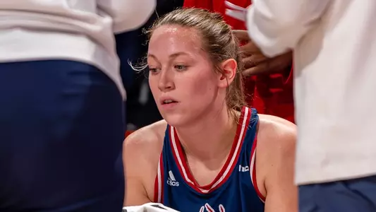 Katie Hill sitting during a timeout
