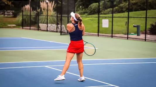 Elizabeth Novak returning a serve