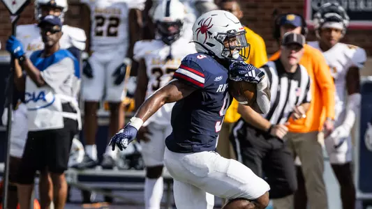 Zach Palmer-Smith runs for the end zone during Richmond's 20-17 win over North Carolina A&T on Oct. 5, 2024