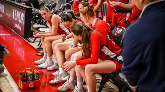Maggie Doogan and Rachel Ullstrom during a timeout