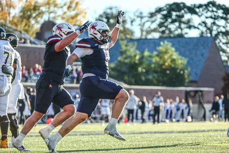 Matei Fitz celebrates after a sack during Richmond's 35-24 Homecoming win over Towson on Nov. 2, 2024