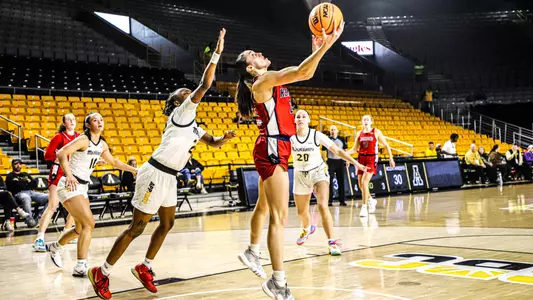 Rachel Ullstrom posting a layup
