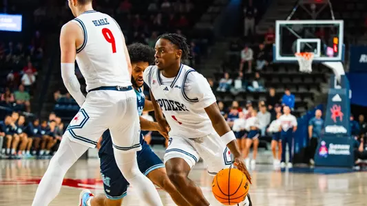 Mikkel Tyne dribbles into the paint