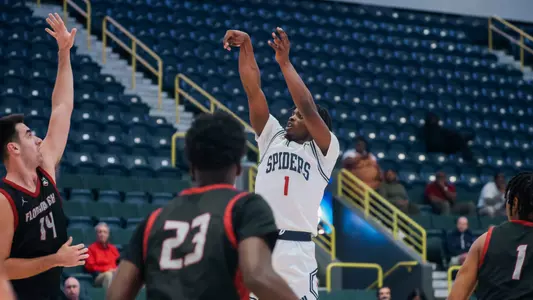 Mikkel Tyne shoots a jump shot vs Florida Tech